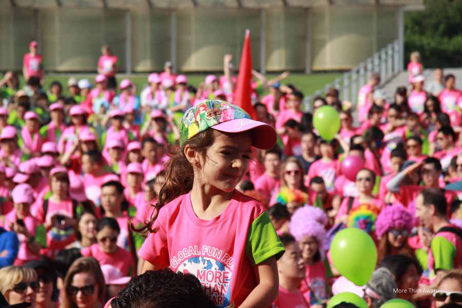 girl riding on shoulders